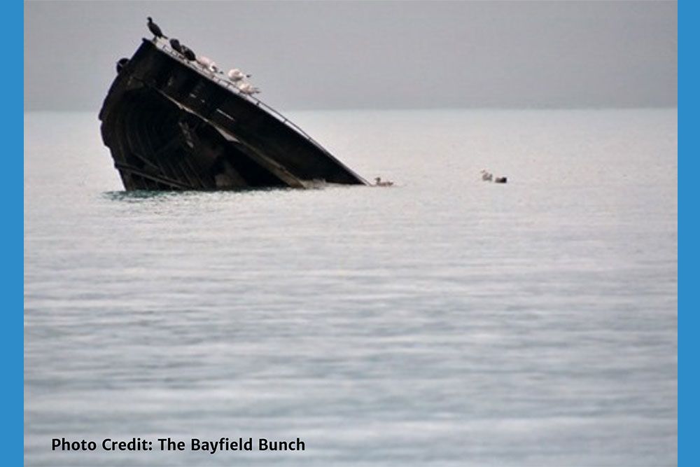 A photo of the shipwreck Lynda Hindman in Bayfield before it became totally submerged.