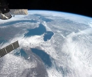Expedition 35A view of the Great Lakes from the International Space Station, capturing lakes Superior, Huron, Michigan, Erie and Ontario as well as the drainage basin shared by the United States and Canada.