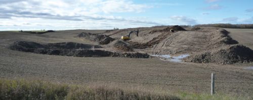 Berm construction underway at the Eadie farm. Berms slow down stormwater drainage, reduce erosion and retain farm topsoil.